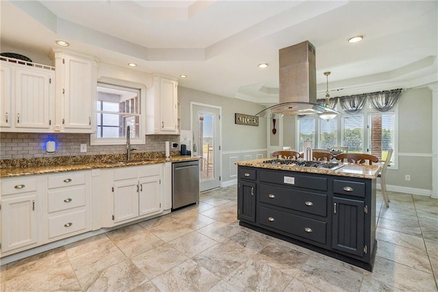 231 Gordon Rd, Cedartown, GA 30125 - kitchen with island exhaust hood, stainless steel appliances, white cabinets, a raised ceiling, and recessed lighting