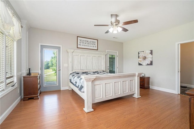 231 Gordon Rd, Cedartown, GA 30125 - bedroom with light wood-type flooring, access to exterior, and a ceiling fan