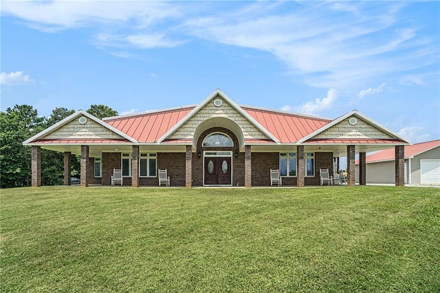 231 Gordon Rd, Cedartown, GA 30125 - craftsman-style house with a standing seam roof, a front yard, covered porch, and a metal roof