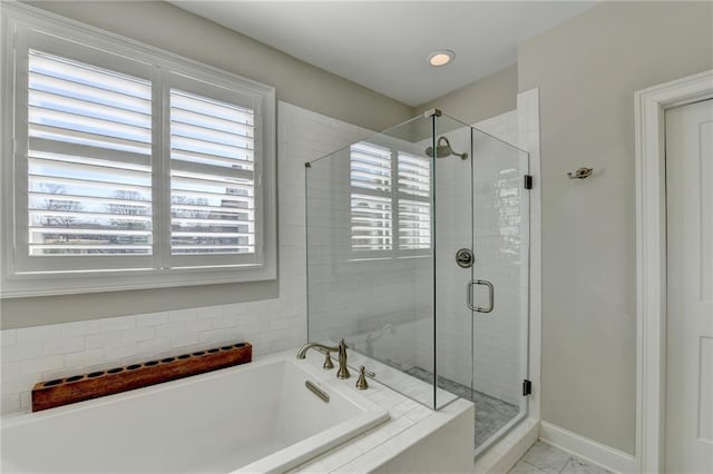 full bathroom featuring a garden tub, recessed lighting, baseboards, and a stall shower