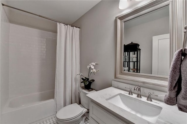 full bathroom featuring toilet, shower / bath combo with shower curtain, and vanity