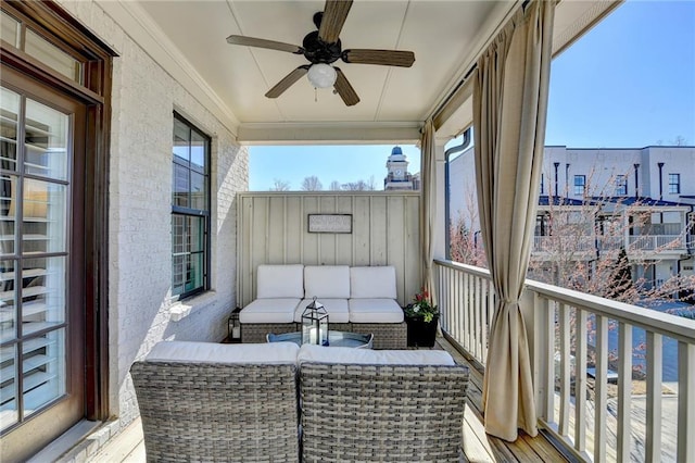 balcony featuring outdoor lounge area and a ceiling fan