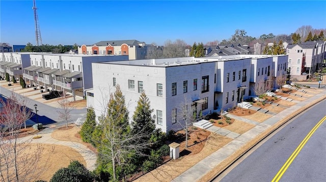 view of building exterior featuring a residential view