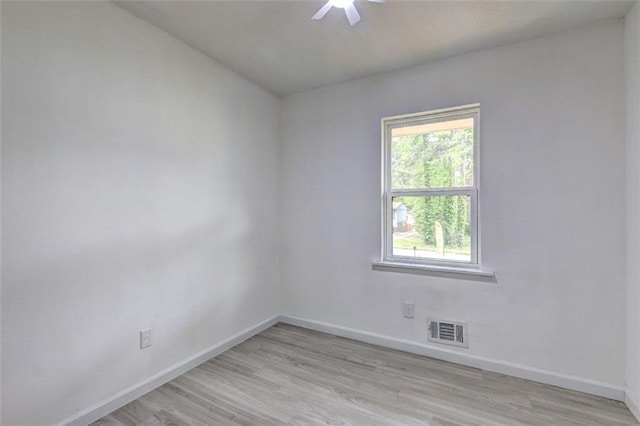 6454 Boca Grande Blvd, Forest Park, GA 30297 - empty room featuring baseboards, light wood finished floors, and ceiling fan