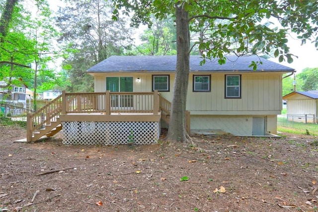 6454 Boca Grande Blvd, Forest Park, GA 30297 - back of property with stairway, a deck, and a shingled roof