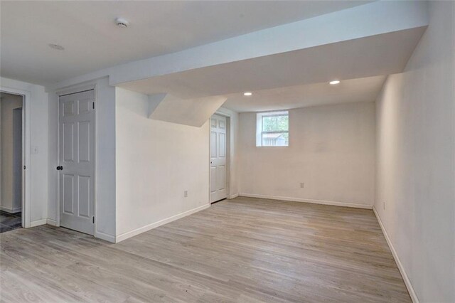 6454 Boca Grande Blvd, Forest Park, GA 30297 - below grade area featuring light wood-style floors, baseboards, and recessed lighting