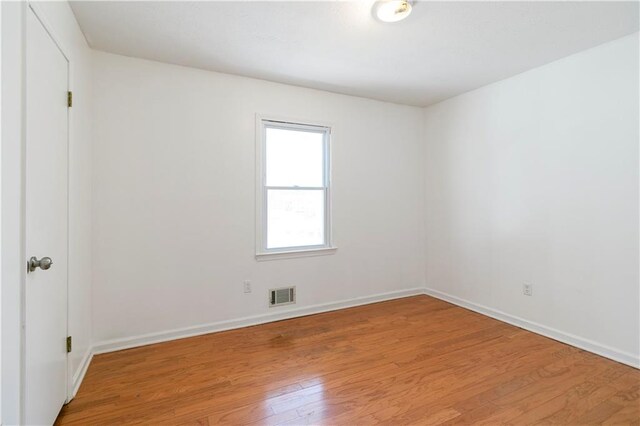 37 Indian Hills Ct, Dallas, GA 30157 - empty room featuring light wood-style flooring, visible vents, and baseboards