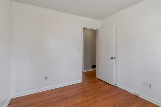 37 Indian Hills Ct, Dallas, GA 30157 - spare room featuring visible vents, baseboards, and wood finished floors