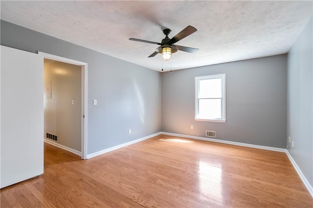 37 Indian Hills Ct, Dallas, GA 30157 - unfurnished room featuring light wood-style floors, visible vents, ceiling fan, and baseboards