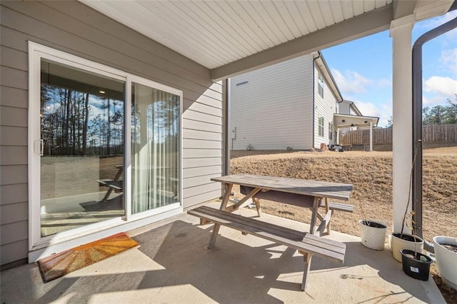 view of patio with fence