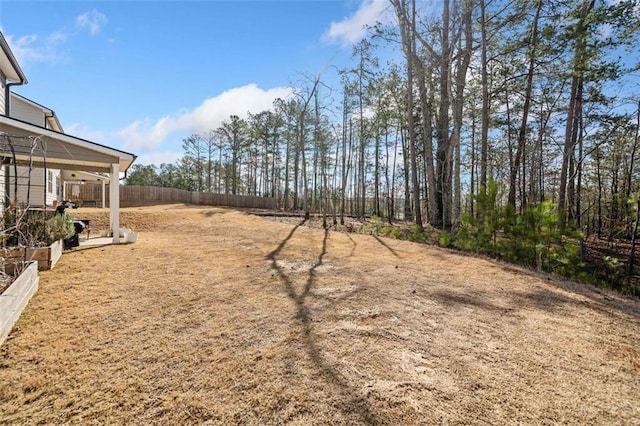 view of yard with fence