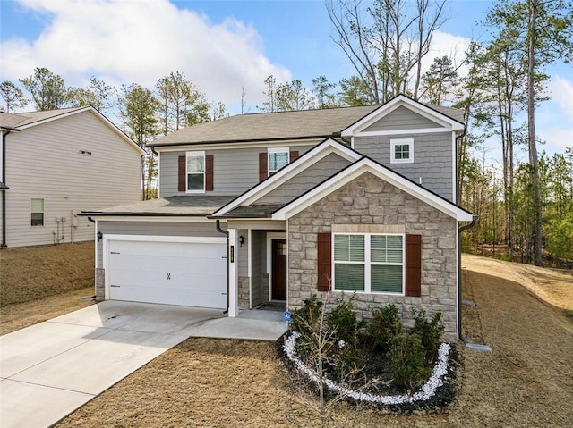 view of front facade featuring stone siding, concrete driveway, and an attached garage