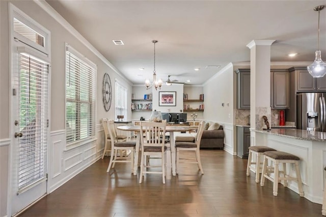 dining area with visible vents, ornamental molding, recessed lighting, a chandelier, and dark wood finished floors