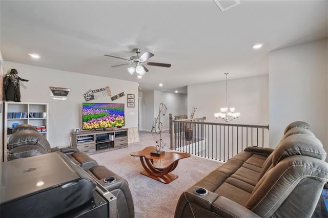 living room with carpet floors, ceiling fan with notable chandelier, recessed lighting, and visible vents