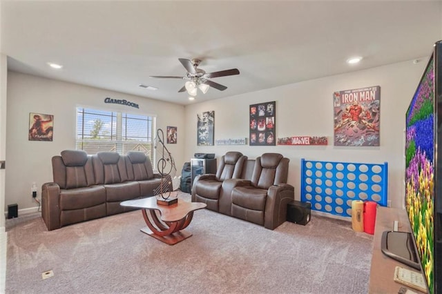 carpeted living room with visible vents, a ceiling fan, and recessed lighting