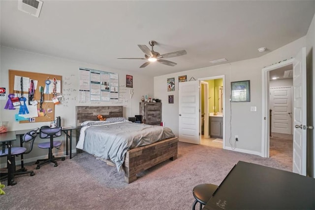 bedroom with a ceiling fan, visible vents, baseboards, connected bathroom, and carpet