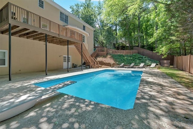 5891 Ranger Ct, Peachtree Corners, GA 30092 - view of pool featuring a patio, a diving board, a deck, and stairway