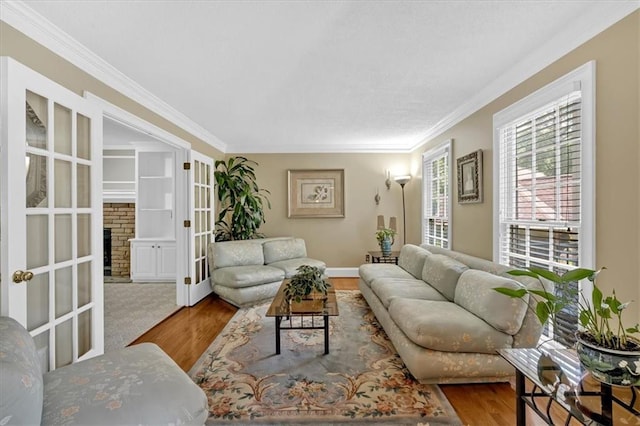 5891 Ranger Ct, Peachtree Corners, GA 30092 - living room with wood finished floors, crown molding, baseboards, and french doors