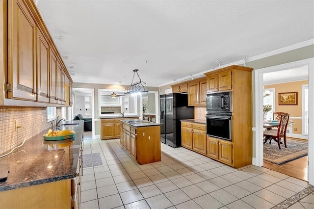 5891 Ranger Ct, Peachtree Corners, GA 30092 - kitchen with black appliances, light tile patterned flooring, decorative backsplash, crown molding, and a center island