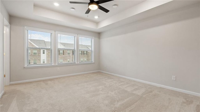 1570 Halbrook Pl, Marietta, GA 30008 - spare room with a ceiling fan, recessed lighting, baseboards, a raised ceiling, and light colored carpet