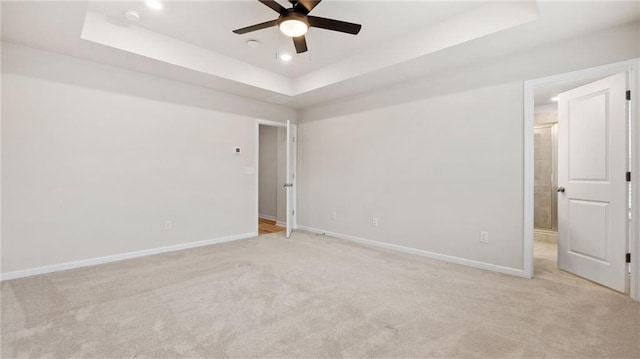 1570 Halbrook Pl, Marietta, GA 30008 - unfurnished room featuring baseboards, a raised ceiling, ceiling fan, light carpet, and recessed lighting