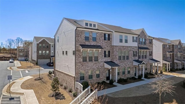 view of building exterior with a residential view