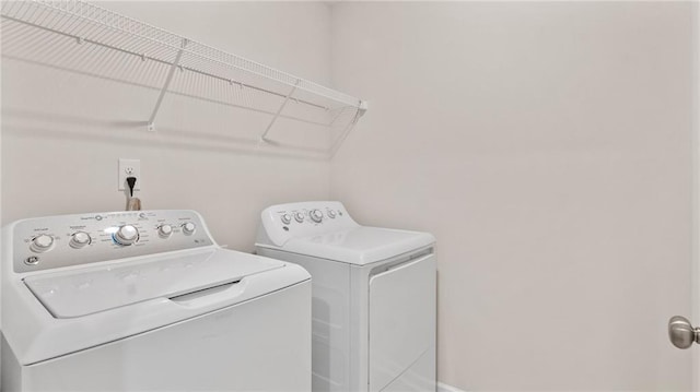 1570 Halbrook Pl, Marietta, GA 30008 - clothes washing area with laundry area and washer and clothes dryer
