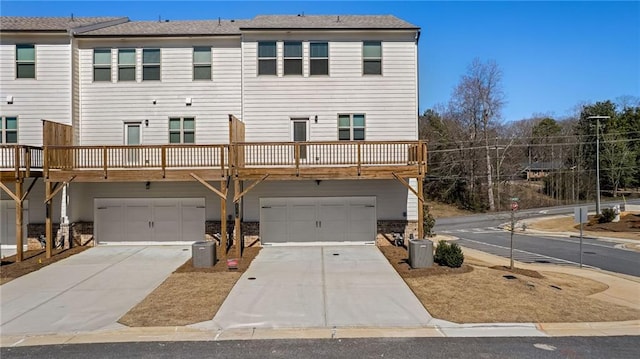 1570 Halbrook Pl, Marietta, GA 30008 - back of property featuring concrete driveway and a garage