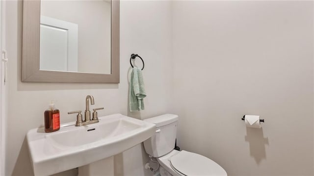 1570 Halbrook Pl, Marietta, GA 30008 - bathroom featuring a sink and toilet