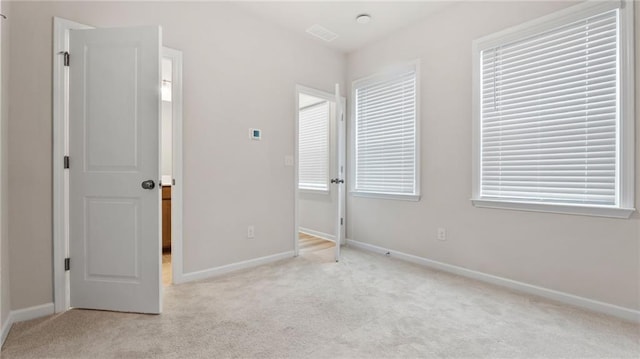 1570 Halbrook Pl, Marietta, GA 30008 - unfurnished bedroom featuring carpet flooring, baseboards, and visible vents