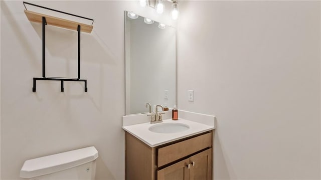 1570 Halbrook Pl, Marietta, GA 30008 - half bath featuring toilet and vanity