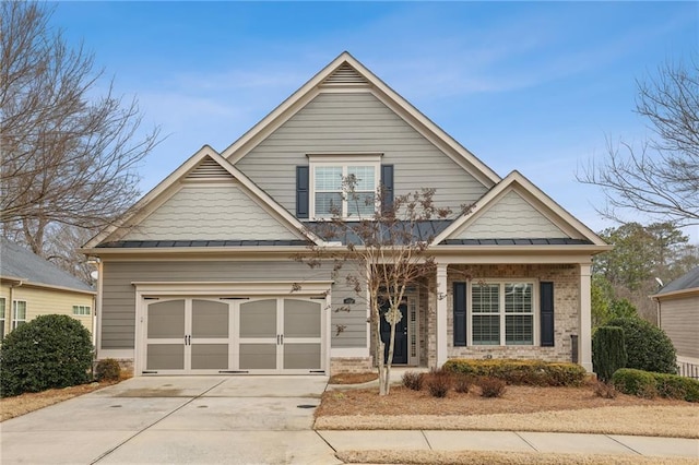 view of front of property featuring a garage