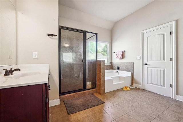 full bathroom featuring lofted ceiling, a garden tub, tile patterned flooring, vanity, and a shower stall