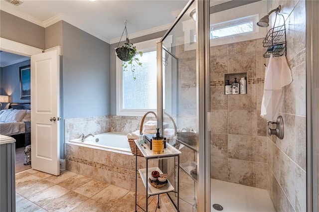 bathroom featuring ornamental molding and independent shower and bath