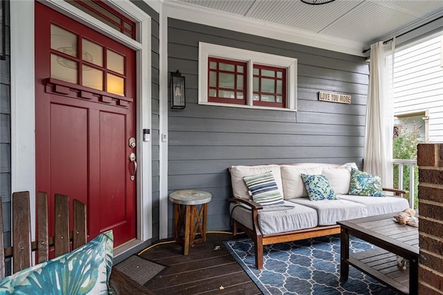 doorway to property featuring a porch