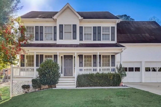 162 Camden Woods Dr, Dallas, GA 30157 - view of front of home featuring covered porch, driveway, and a front lawn