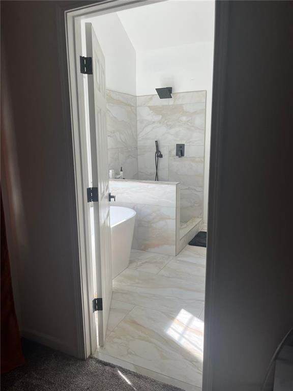 162 Camden Woods Dr, Dallas, GA 30157 - full bath with a marble finish shower, a soaking tub, and marble look tile flooring