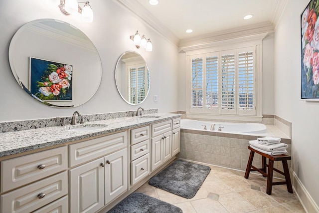 bathroom featuring tile patterned flooring, tiled tub, vanity, and ornamental molding