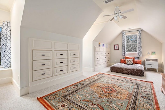 bedroom with vaulted ceiling, carpet floors, and ceiling fan