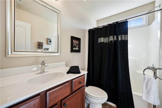 full bathroom with toilet, shower / bath combo, and vanity