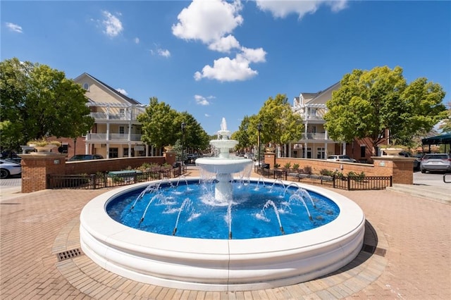 view of pool with pool water feature