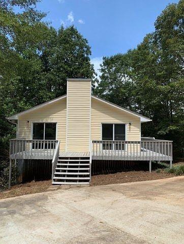 view of front of house featuring a deck