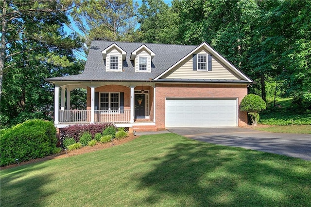 27 Planters Dr NW, Cartersville, GA 30120 - cape cod house featuring asphalt driveway, brick siding, covered porch, and a front lawn