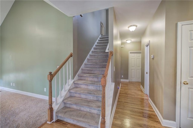 27 Planters Dr NW, Cartersville, GA 30120 - stairway with baseboards and wood finished floors