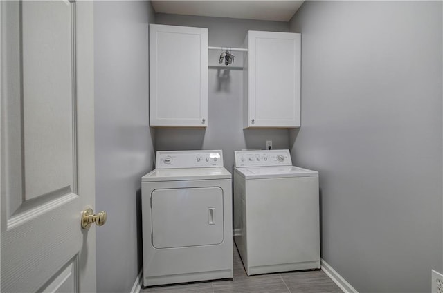 27 Planters Dr NW, Cartersville, GA 30120 - laundry room featuring washer and dryer, cabinet space, and baseboards
