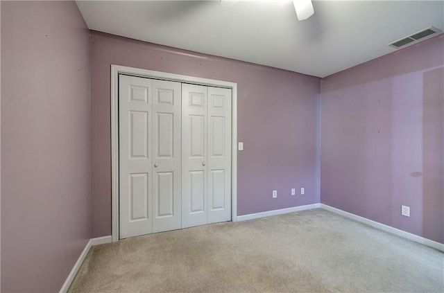 27 Planters Dr NW, Cartersville, GA 30120 - unfurnished bedroom with carpet floors, baseboards, a closet, and a ceiling fan