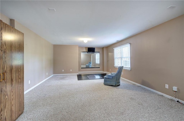 27 Planters Dr NW, Cartersville, GA 30120 - unfurnished living room featuring carpet flooring and baseboards