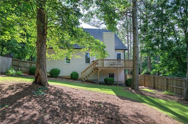 27 Planters Dr NW, Cartersville, GA 30120 - back of house with stairway, a wooden deck, and a chimney