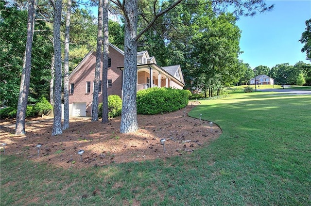 27 Planters Dr NW, Cartersville, GA 30120 - view of property exterior featuring an attached garage, a lawn, and brick siding