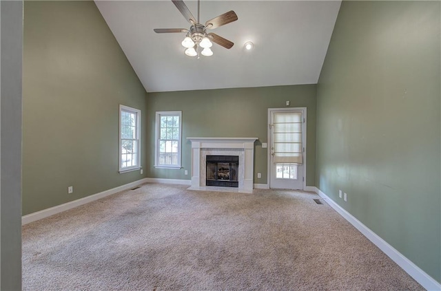 27 Planters Dr NW, Cartersville, GA 30120 - unfurnished living room featuring high vaulted ceiling, ceiling fan, light carpet, baseboards, and a tile fireplace